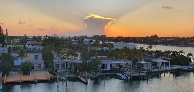 8530 Byron Ave Unit 502, Miami Beach, FL 33141 - water view with nearby suburban area and a boat dock