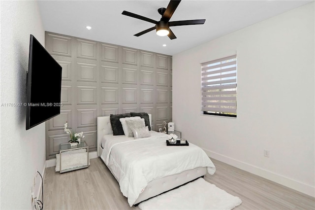 bedroom with recessed lighting, light wood-style flooring, baseboards, and ceiling fan