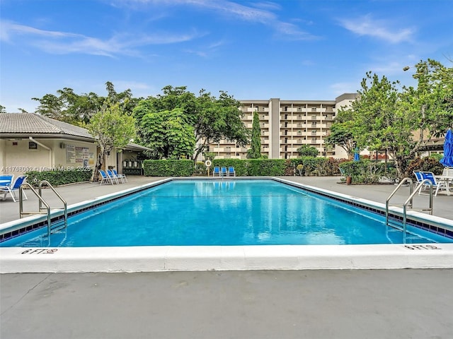 pool with a patio area