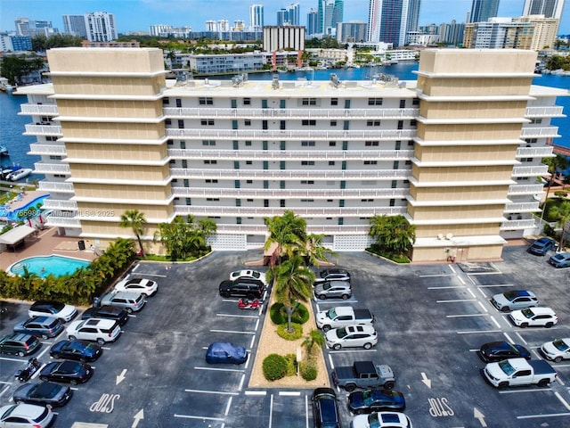 410 Golden Isles Dr Unit 603, Hallandale Beach, FL 33009 - view of property with a city view, a water view, and uncovered parking