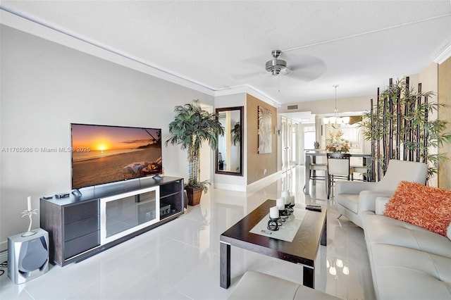 410 Golden Isles Dr Unit 603, Hallandale Beach, FL 33009 - living room featuring tile patterned floors, visible vents, crown molding, and ceiling fan with notable chandelier