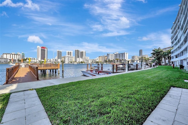 410 Golden Isles Dr Unit 603, Hallandale Beach, FL 33009 - view of dock with a view of city, a yard, and a water view