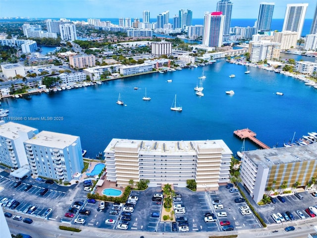 410 Golden Isles Dr Unit 603, Hallandale Beach, FL 33009 - drone / aerial view featuring a city view and a water view