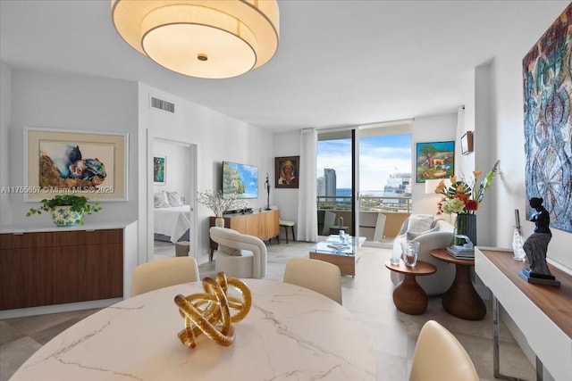 888 Brickell Key Dr Unit 1502, Miami, FL 33131 - dining room with floor to ceiling windows