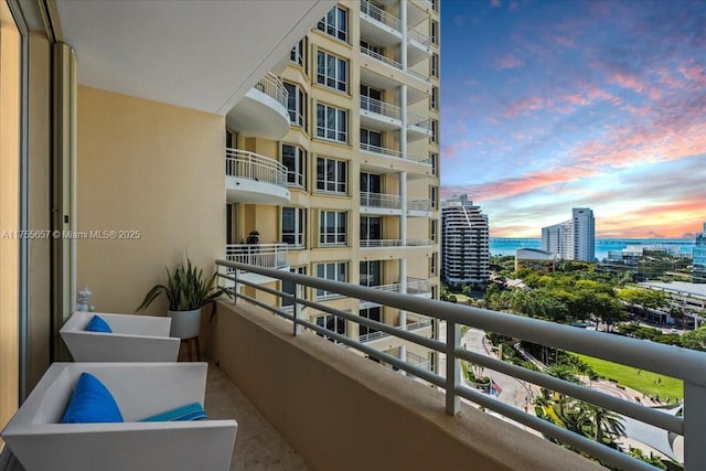 888 Brickell Key Dr Unit 1502, Miami, FL 33131 - balcony at dusk with a view of city