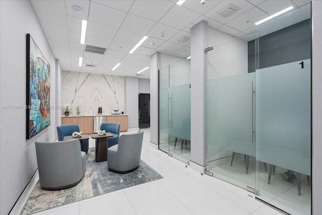 888 Brickell Key Dr Unit 1502, Miami, FL 33131 - interior space featuring a paneled ceiling and tile patterned floors