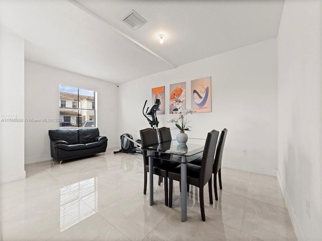 dining area featuring visible vents and baseboards