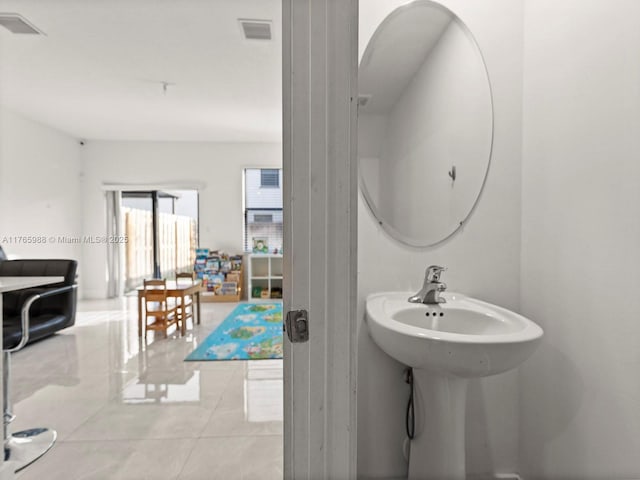 bathroom with tile patterned floors and visible vents