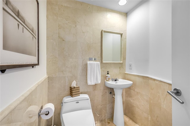 1000 S Pointe Dr Unit 506, Miami Beach, FL 33139 - half bath featuring toilet and tile walls