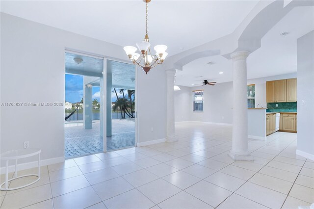 6425 SW 164th Ave, Miami, FL 33193 - unfurnished room featuring ornate columns, ceiling fan, light tile patterned floors, a chandelier, and baseboards
