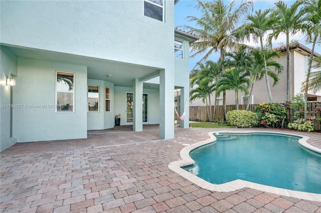 view of swimming pool with fence, a patio, and a fenced in pool
