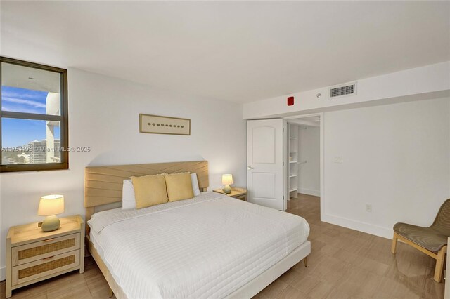 6820 Indian Creek Dr Unit 9A, Miami Beach, FL 33141 - bedroom featuring baseboards and visible vents