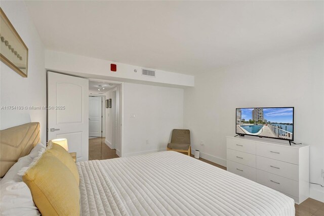 6820 Indian Creek Dr Unit 9A, Miami Beach, FL 33141 - bedroom with baseboards and visible vents