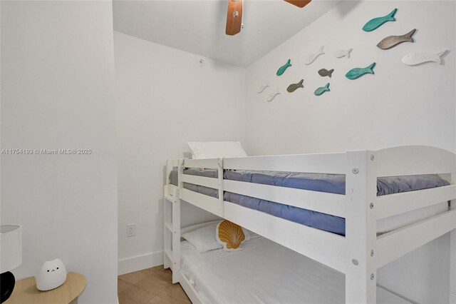 6820 Indian Creek Dr Unit 9A, Miami Beach, FL 33141 - bedroom featuring baseboards and ceiling fan