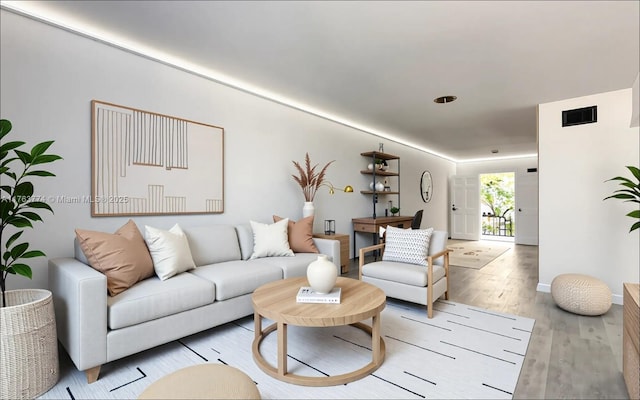 1770 E Las Olas Blvd Unit 302, Fort Lauderdale, FL 33301 - living room featuring light wood finished floors