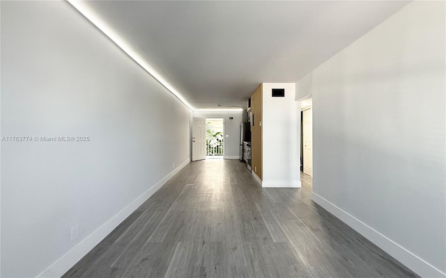 1770 E Las Olas Blvd Unit 302, Fort Lauderdale, FL 33301 - hall with dark wood-style flooring and baseboards