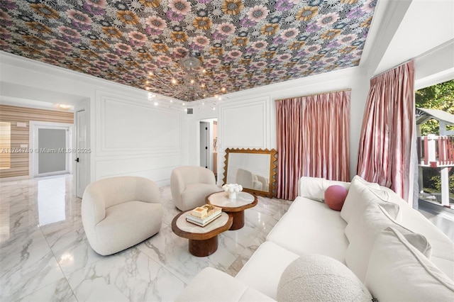living area featuring marble finish floor
