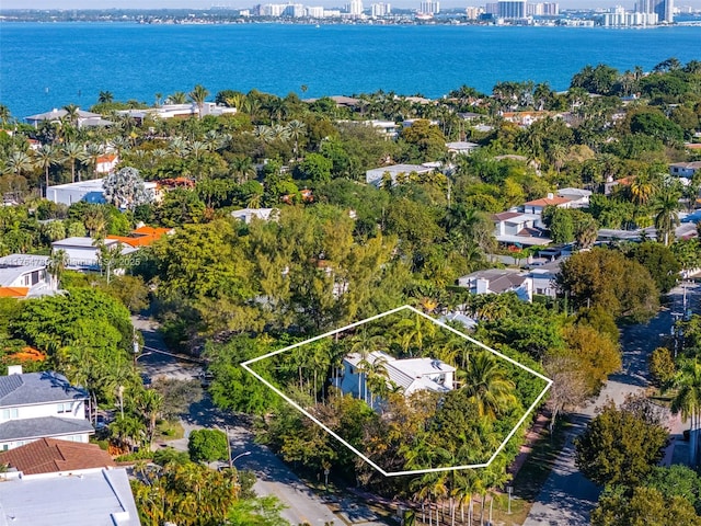 drone / aerial view with a water view and a view of city