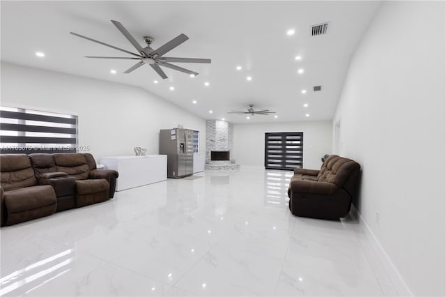 18650 SW 127th Ct, Miami, FL 33177 - living area with a ceiling fan, recessed lighting, light marble finish flooring, lofted ceiling, and a large fireplace
