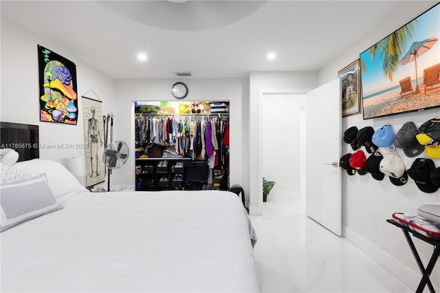 18650 SW 127th Ct, Miami, FL 33177 - bedroom with recessed lighting, marble look tiles, and a closet