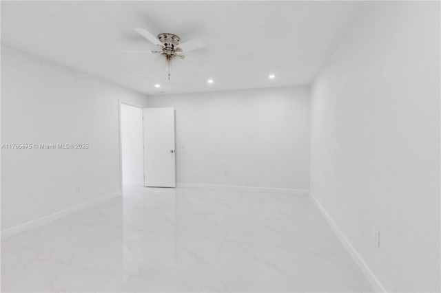 18650 SW 127th Ct, Miami, FL 33177 - spare room with marble look tile flooring, a ceiling fan, and recessed lighting