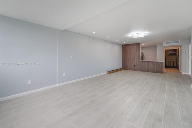 1710 NE 191st St Unit 315-3, Miami, FL 33179 - unfurnished room featuring visible vents, light wood-type flooring, and baseboards