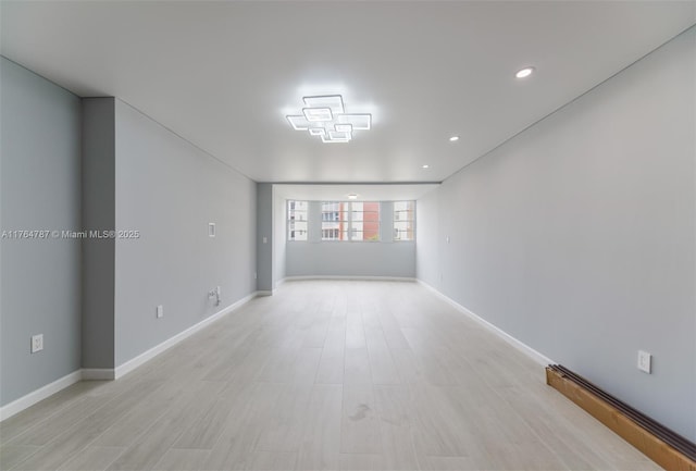 1710 NE 191st St Unit 315-3, Miami, FL 33179 - unfurnished room featuring recessed lighting, baseboards, and light wood-style floors