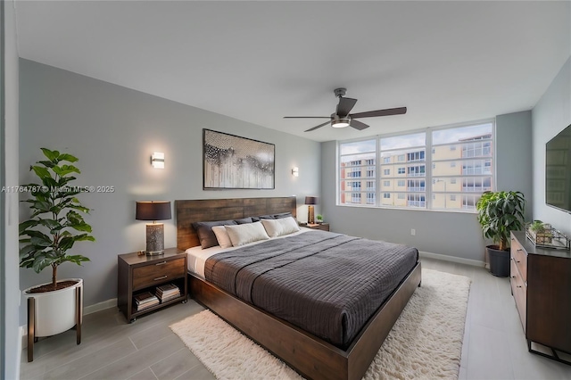 1710 NE 191st St Unit 315-3, Miami, FL 33179 - bedroom featuring a ceiling fan and baseboards
