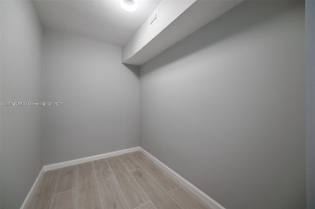 1710 NE 191st St Unit 315-3, Miami, FL 33179 - interior space with visible vents, baseboards, and light wood-style flooring