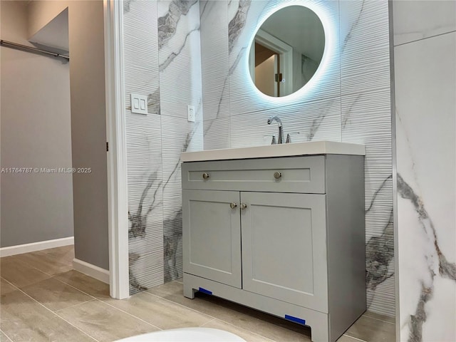 1710 NE 191st St Unit 315-3, Miami, FL 33179 - bathroom with vanity and baseboards
