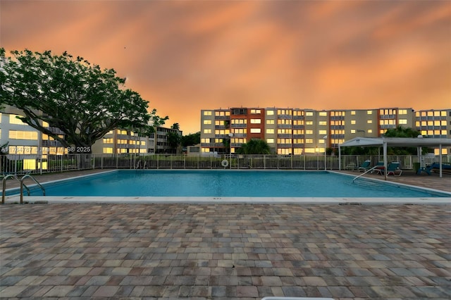 1710 NE 191st St Unit 315-3, Miami, FL 33179 - community pool with a patio and fence