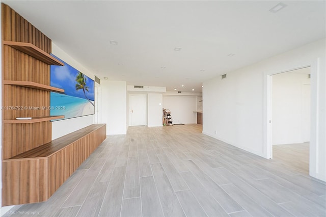 1000 Quayside Ter Unit 903, Miami, FL 33138 - unfurnished living room featuring visible vents and wood finish floors