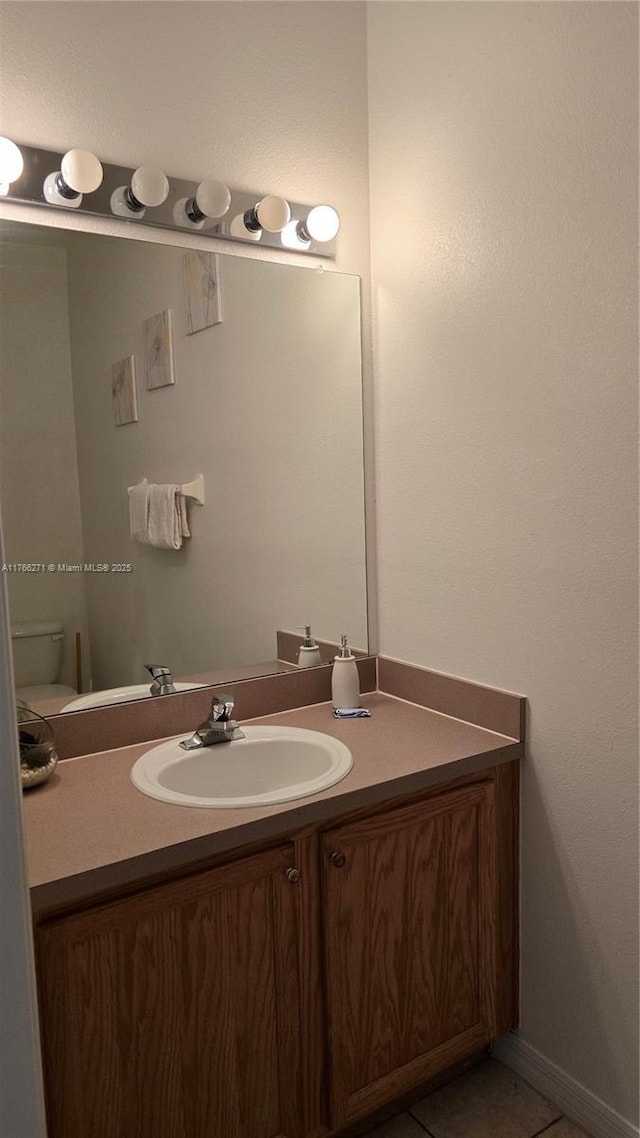 1013 Park Ridge Cir, Kissimmee, FL 34746 - half bathroom featuring vanity and tile patterned floors