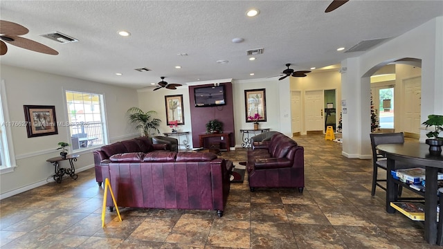 1013 Park Ridge Cir, Kissimmee, FL 34746 - living room with visible vents and ceiling fan