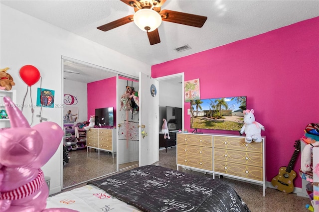 5233 NE 4th Ave, Oakland Park, FL 33334 - bedroom with speckled floor, a textured ceiling, a closet, and visible vents