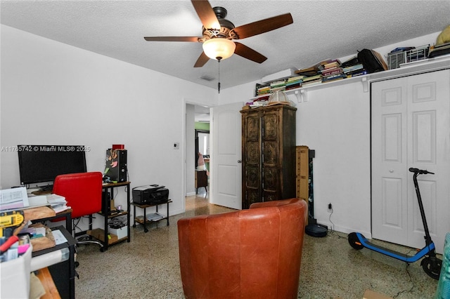 5233 NE 4th Ave, Oakland Park, FL 33334 - office with visible vents, a textured ceiling, speckled floor, and a ceiling fan