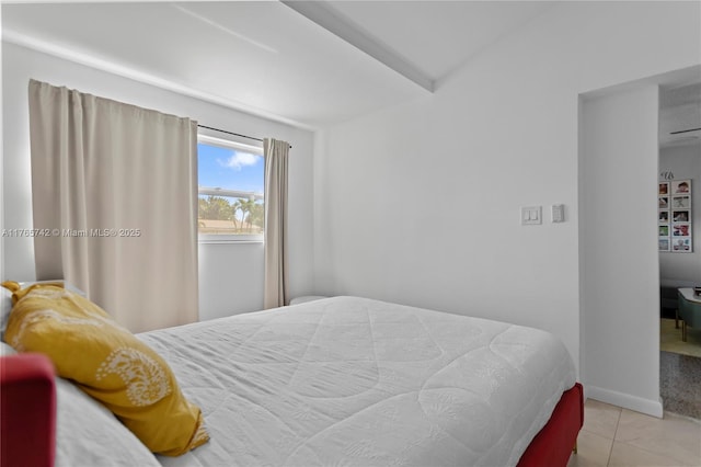 5233 NE 4th Ave, Oakland Park, FL 33334 - tiled bedroom featuring baseboards