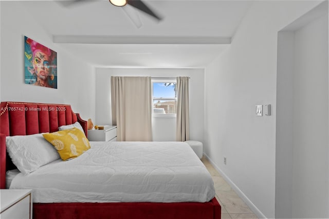 5233 NE 4th Ave, Oakland Park, FL 33334 - tiled bedroom with baseboards and ceiling fan