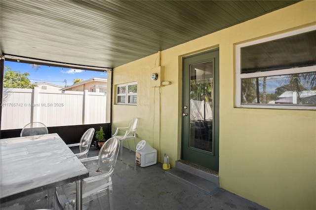 5233 NE 4th Ave, Oakland Park, FL 33334 - view of patio featuring fence and outdoor dining space
