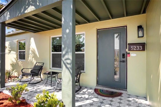 5233 NE 4th Ave, Oakland Park, FL 33334 - entrance to property with stucco siding and a patio area
