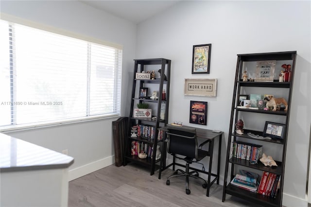 9203 NW 9th Ct, Plantation, FL 33324 - office space with baseboards and wood finished floors