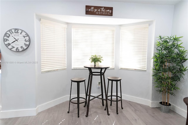 9203 NW 9th Ct, Plantation, FL 33324 - dining area featuring baseboards and wood finished floors