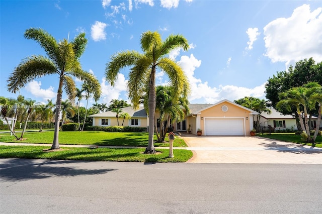 311 NW 197th Ave, Pembroke Pines, FL 33029 - single story home with a garage, stucco siding, a front yard, and concrete driveway