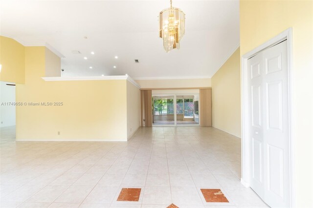 311 NW 197th Ave, Pembroke Pines, FL 33029 - spare room with crown molding, baseboards, a notable chandelier, and light tile patterned floors