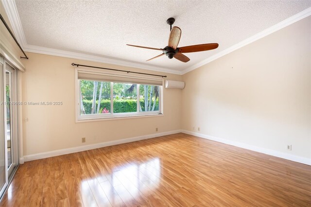311 NW 197th Ave, Pembroke Pines, FL 33029 - spare room featuring light wood-style flooring, a textured ceiling, a wall unit AC, a ceiling fan, and crown molding