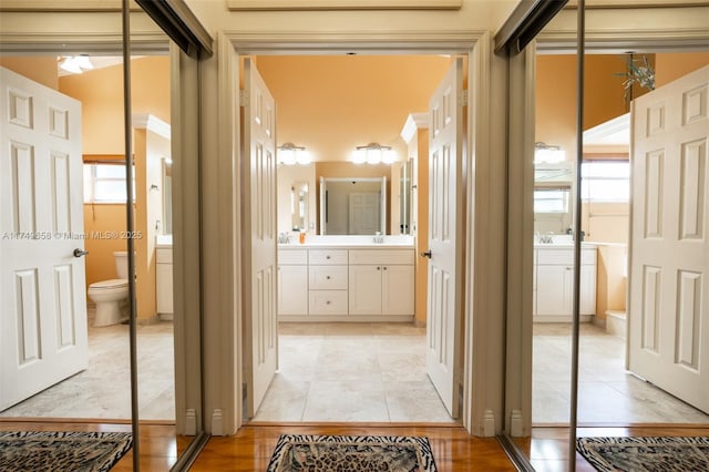 311 NW 197th Ave, Pembroke Pines, FL 33029 - hallway with a sink and light tile patterned floors