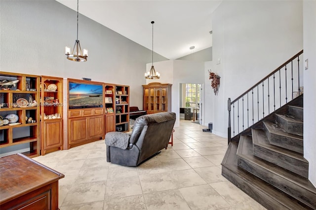 15852 SW 14th St, Pembroke Pines, FL 33027 - living room featuring a chandelier, stairs, high vaulted ceiling, and light tile patterned flooring