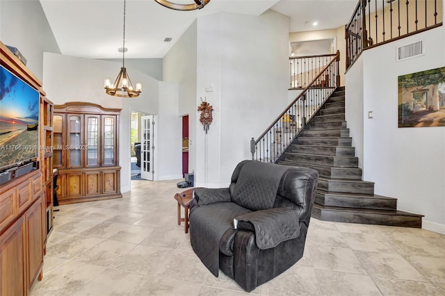 15852 SW 14th St, Pembroke Pines, FL 33027 - foyer with a chandelier, stairs, a high ceiling, and light tile patterned floors