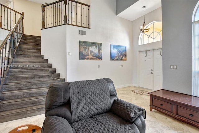 15852 SW 14th St, Pembroke Pines, FL 33027 - entryway with a high ceiling, stairway, a chandelier, and healthy amount of natural light