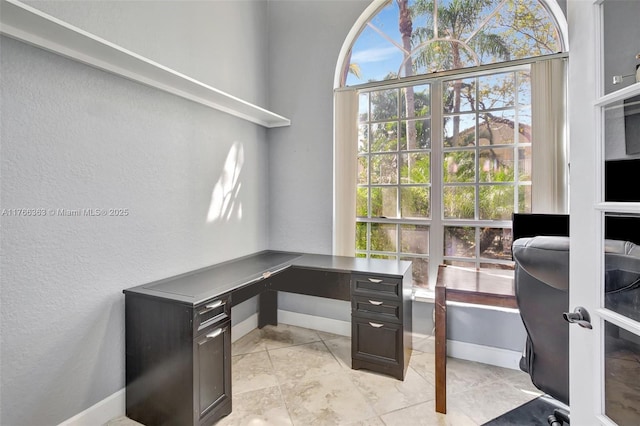 15852 SW 14th St, Pembroke Pines, FL 33027 - office area featuring healthy amount of natural light and a textured wall